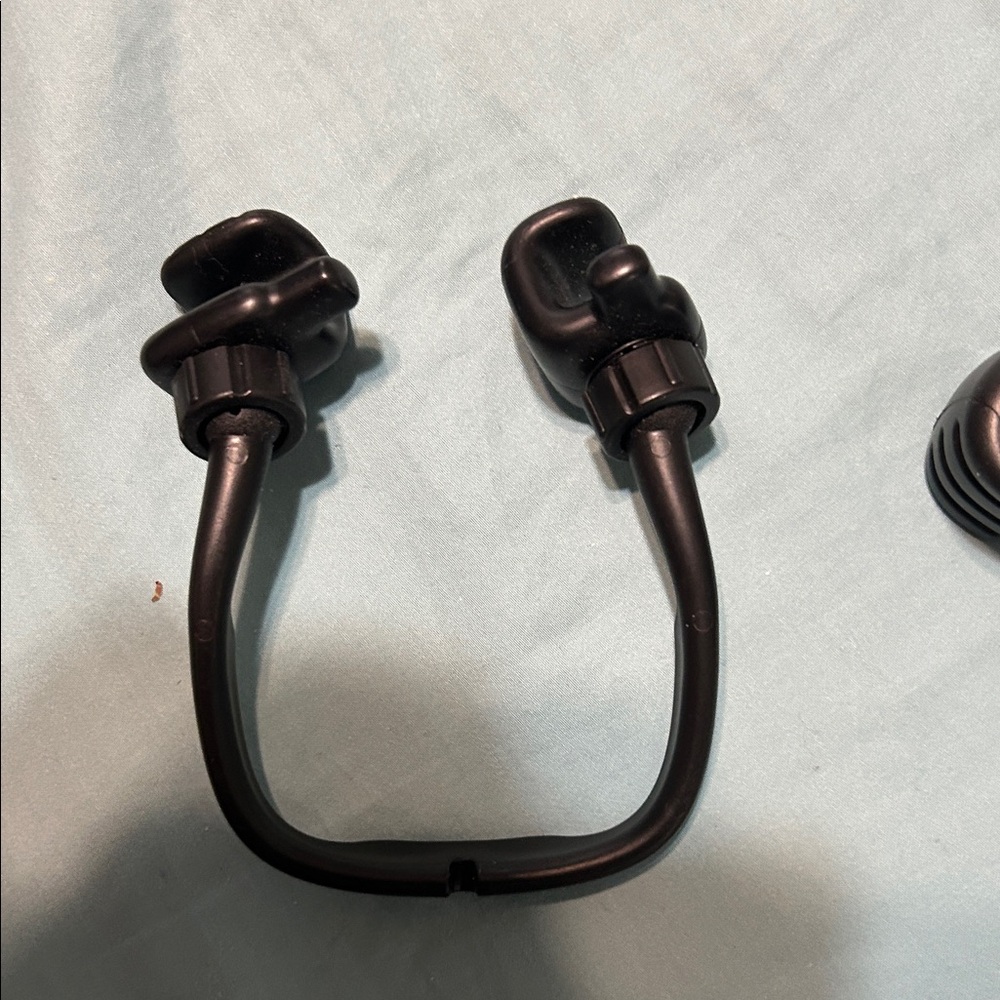 Black phone holders. One can move hands. Other cannot. New - Picture 3 of 4